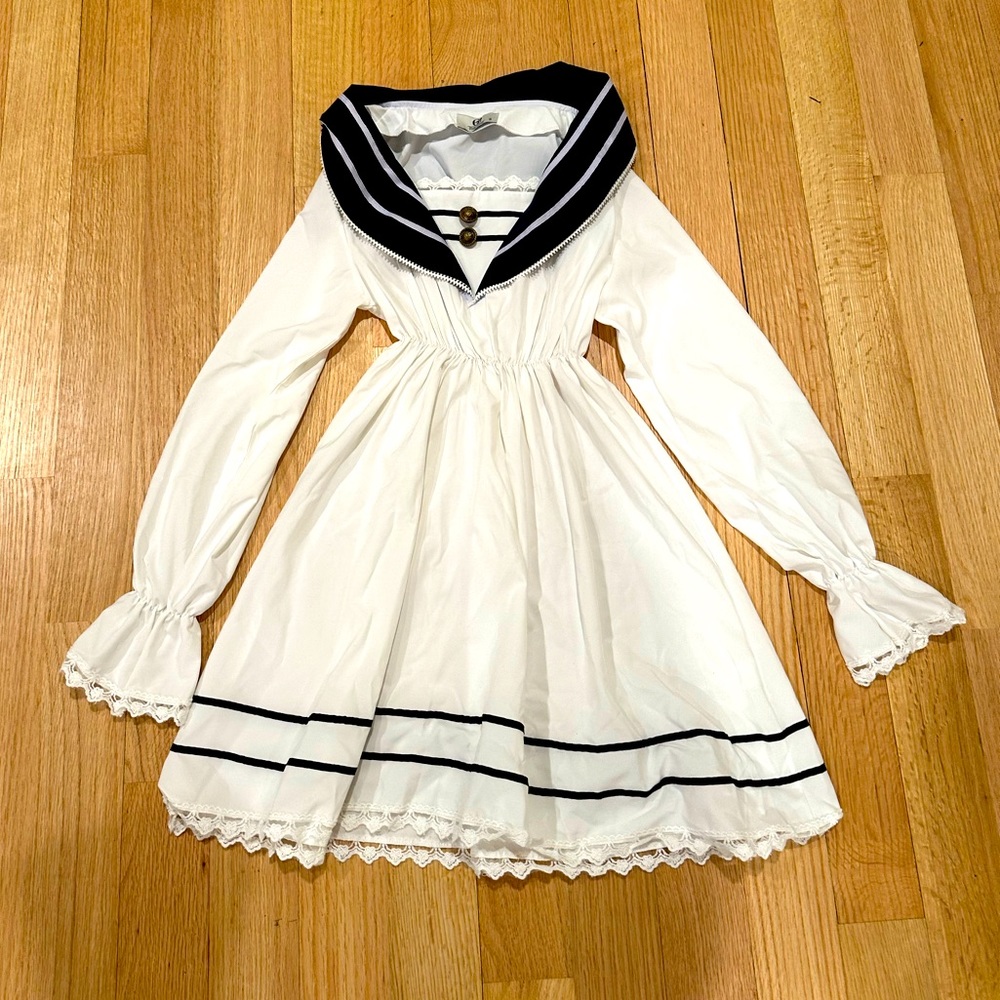Rolecos Women’s Sailor Dress Navy and White with buttons size Small. Never worn.
